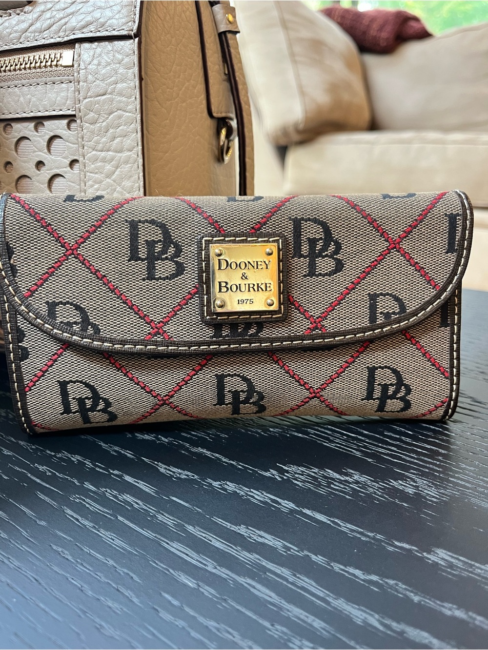 Dooney & Bourke Tan Wallet with Red Stitching and Black Logo
